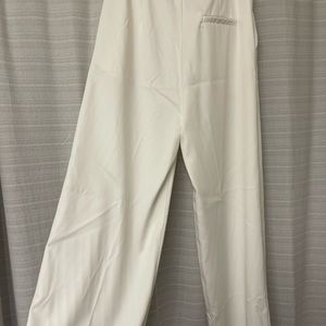 White trousers. Great for workwear or a bachelorette outfit!